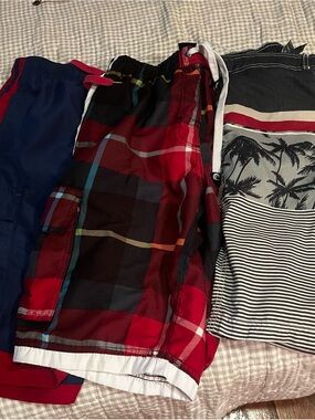 3 pairs of men’s swim trunks